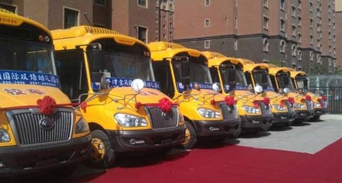 宇通“六一”獻(xiàn)禮烏魯木齊幼兒園 10輛專用校車交付